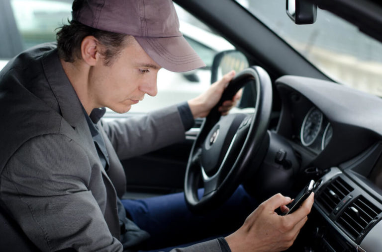 Texting and driving is highly dangerous and can really hurt your truck insurance rates.
