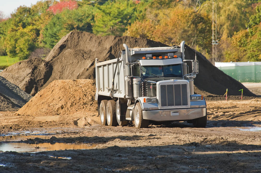 There are a few ways to save money on your dump truck insurance coverage.