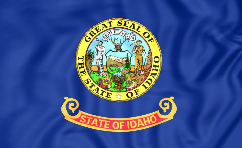 An image of the Idaho state flag, where you should have truck insurance.