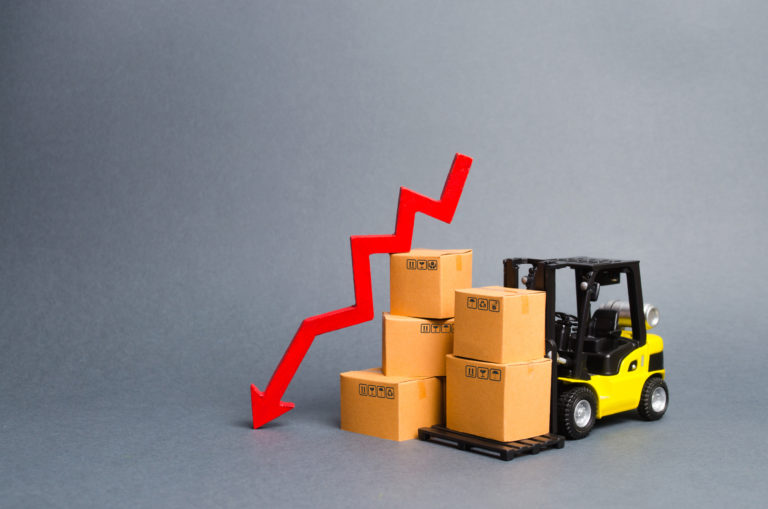 An image of a forklift propping up boxes next to a red arrow descending, likely the result of someone not having truck insurance for their business.
