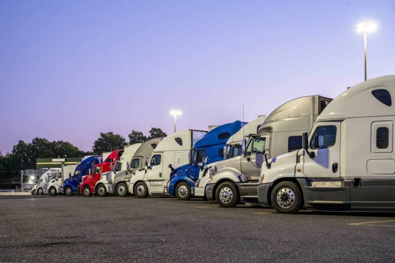 An image of a fleet of trucks covered by truck insurance.
